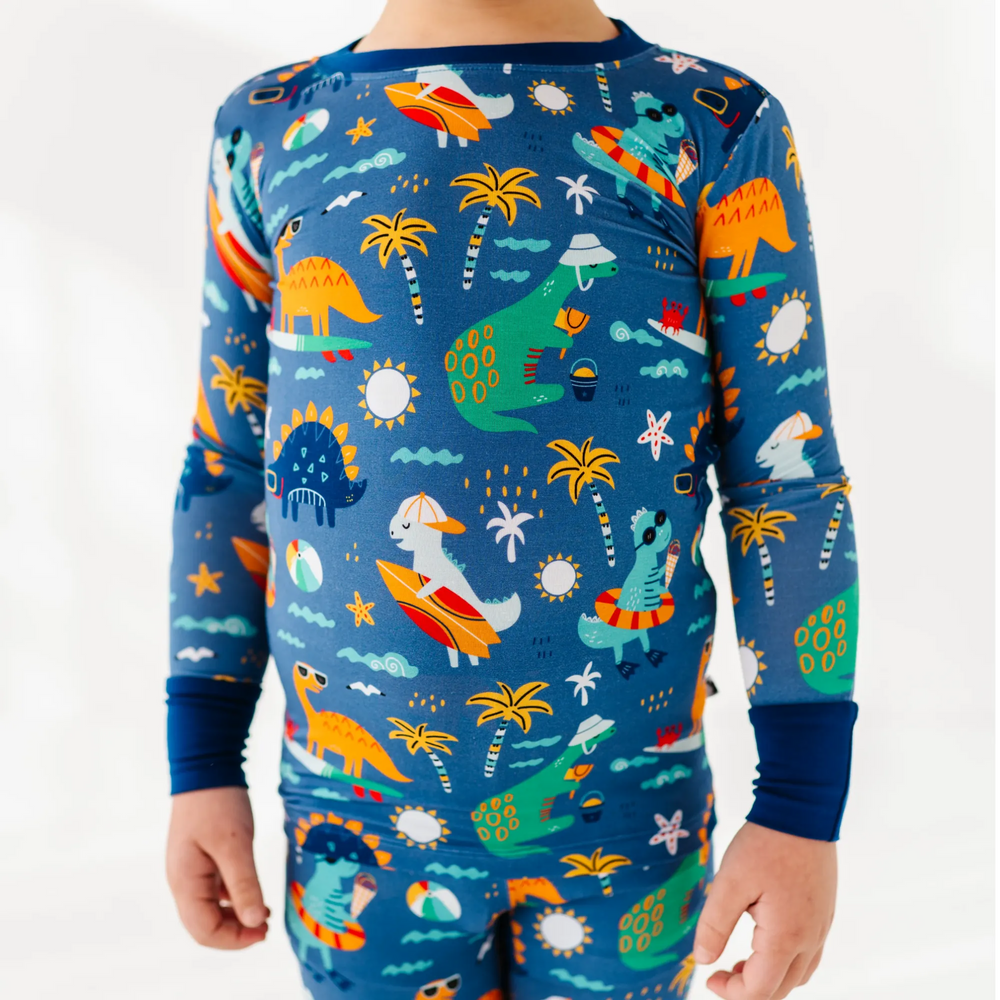 
                      
                        Blue dinosaur bamboo pajamas by Kiki and Lulu
                      
                    