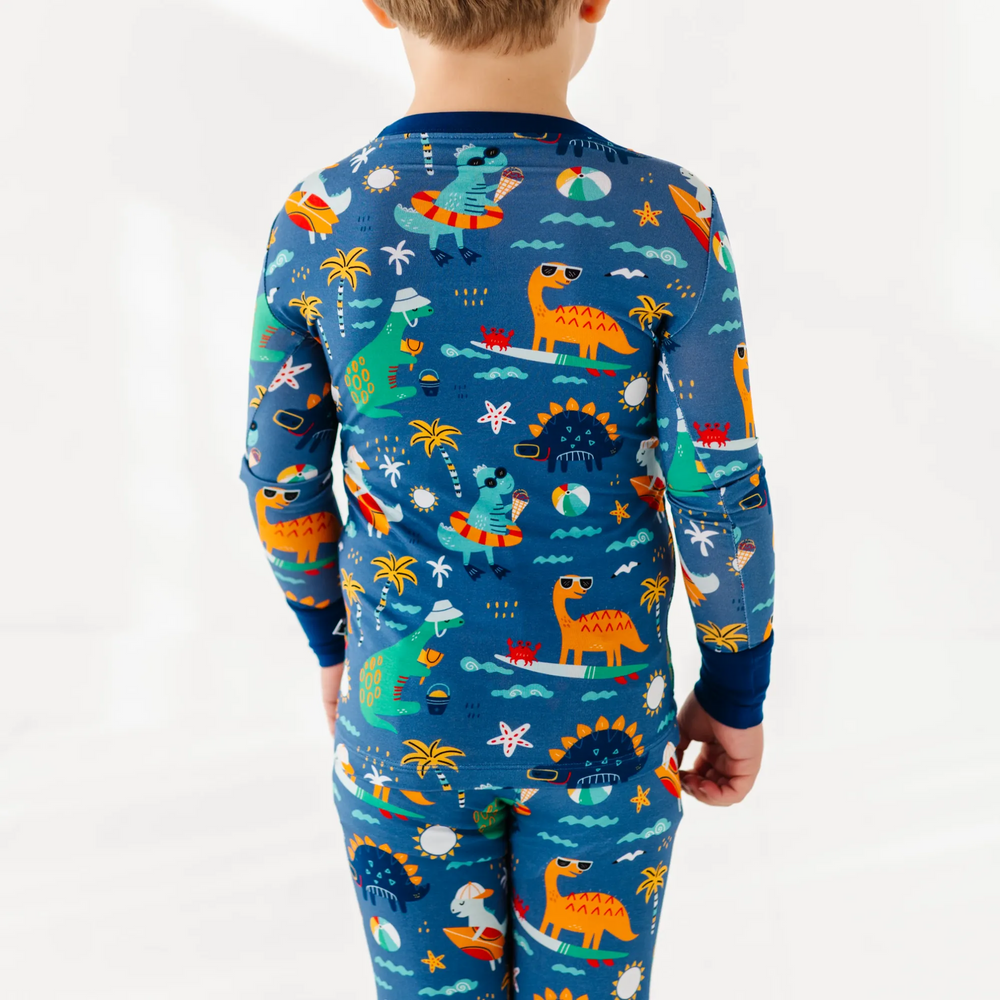 
                      
                        Blue dinosaur bamboo pajamas by Kiki and Lulu
                      
                    