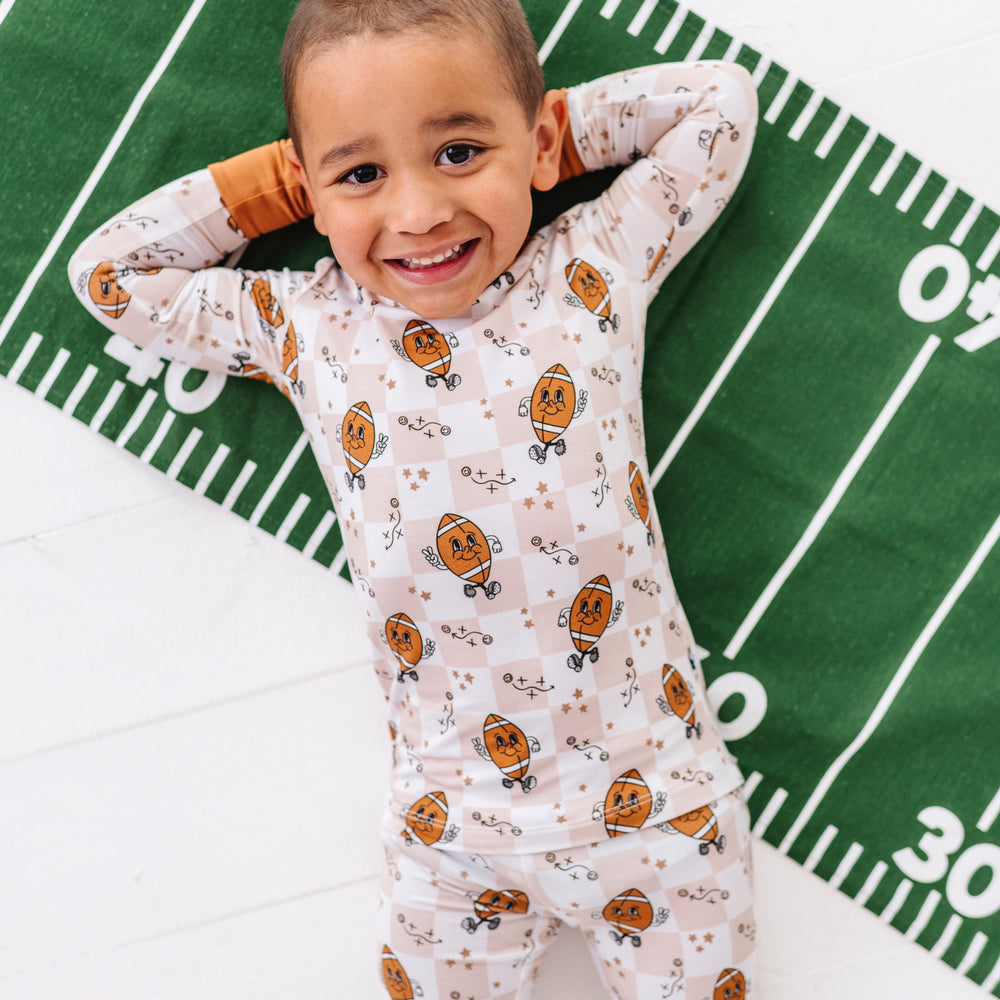 
                      
                        Pigskin Pals Kids Pajamas
                      
                    