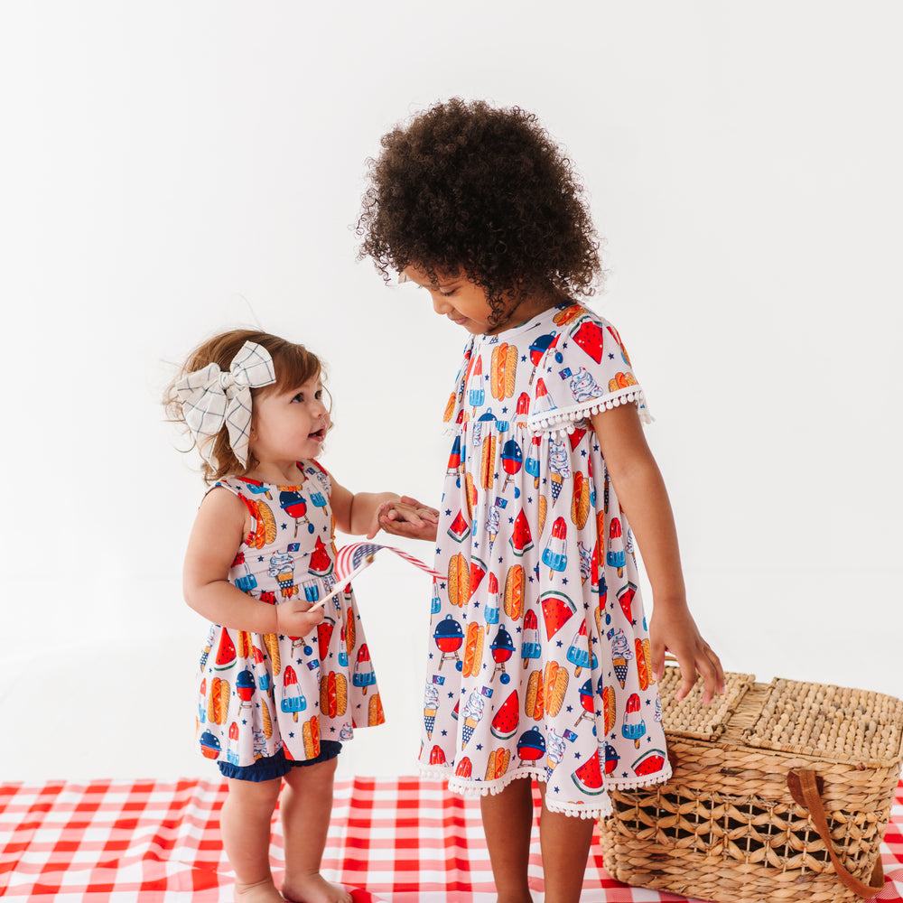 
                      
                        Red, White & BBQ Pom Pom Dress
                      
                    