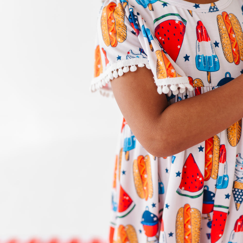 
                      
                        Red, White & BBQ Pom Pom Dress
                      
                    