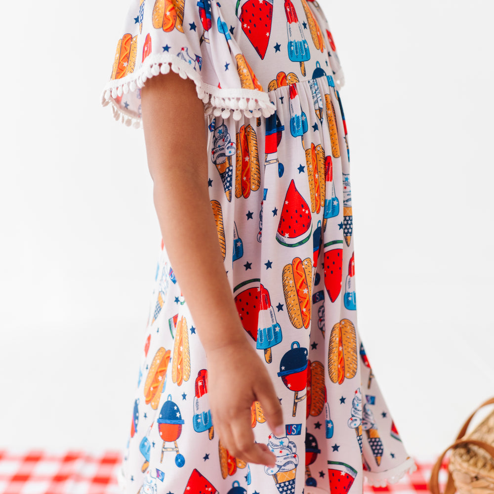 
                      
                        Red, White & BBQ Pom Pom Dress
                      
                    