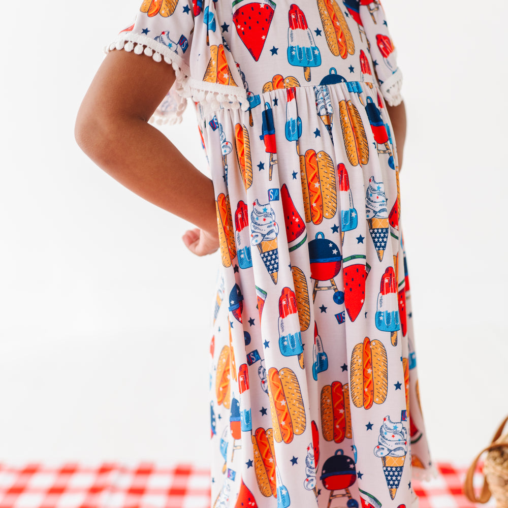 
                      
                        Red, White & BBQ Pom Pom Dress
                      
                    