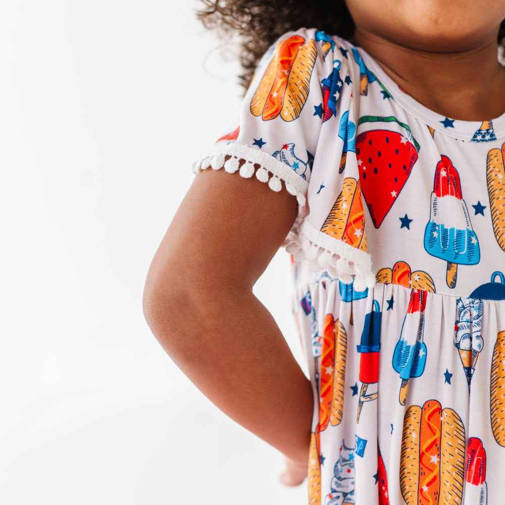 
                      
                        Red, White & BBQ Pom Pom Dress
                      
                    