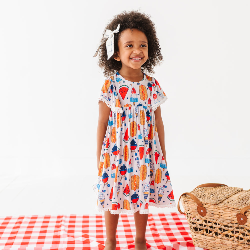 
                      
                        Red, White & BBQ Pom Pom Dress
                      
                    