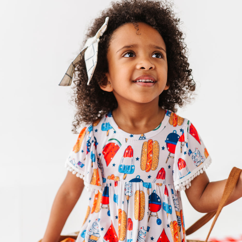 
                      
                        Red, White & BBQ Pom Pom Dress
                      
                    