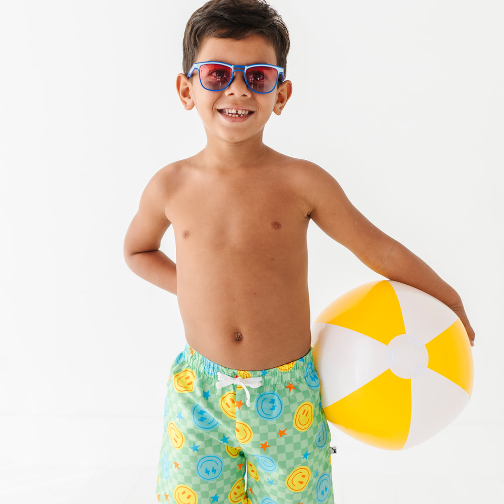 
                      
                        Electric Smiles Swim Trunks
                      
                    