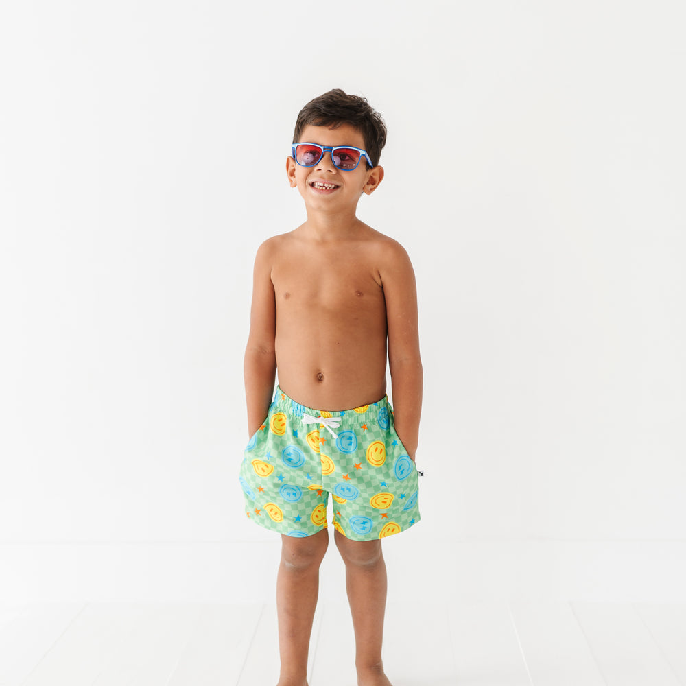 
                      
                        Electric Smiles Swim Trunks
                      
                    