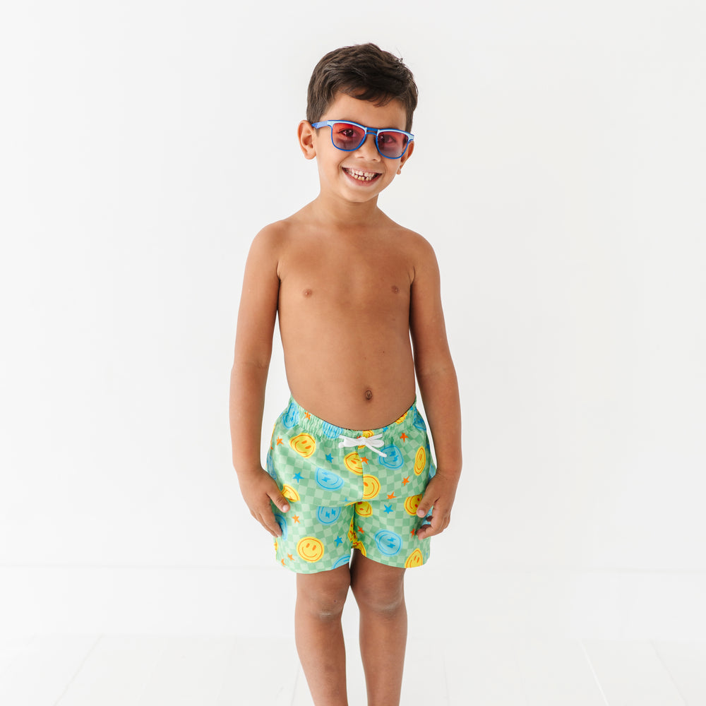 
                      
                        Electric Smiles Swim Trunks
                      
                    