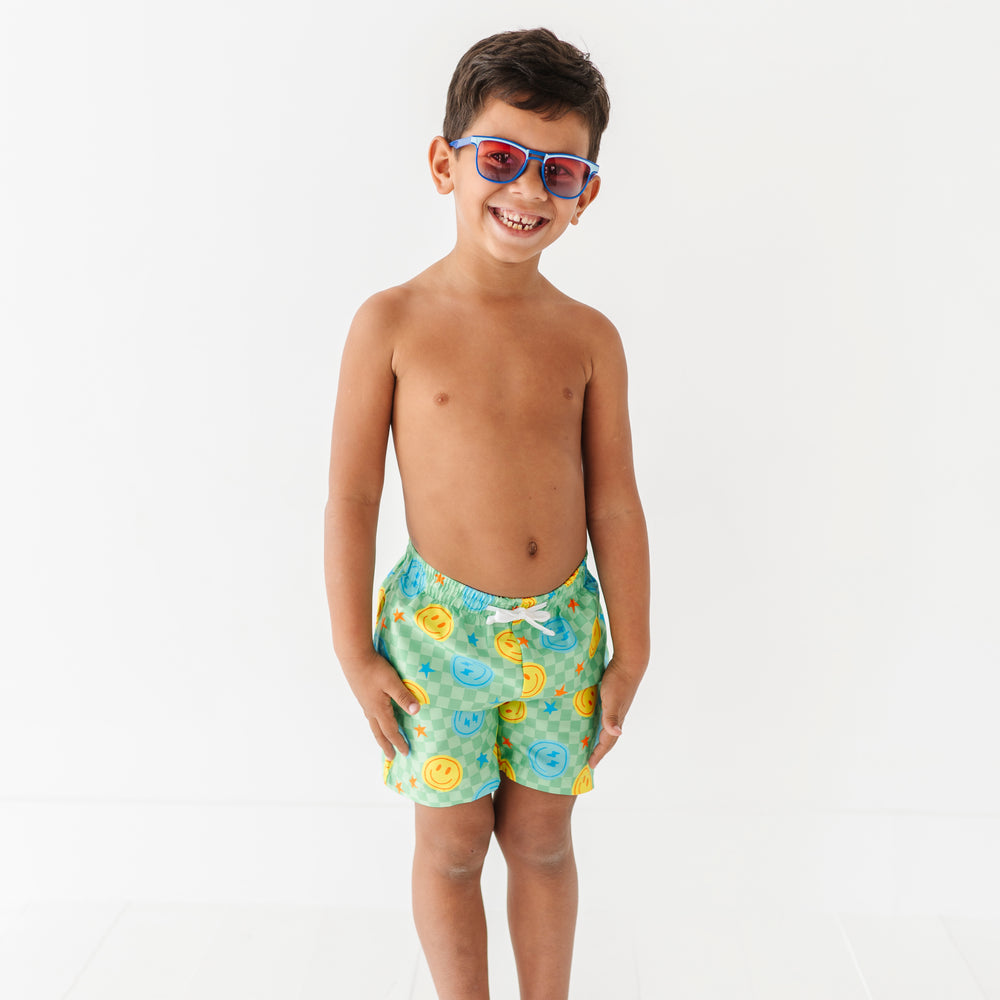
                      
                        Electric Smiles Swim Trunks
                      
                    