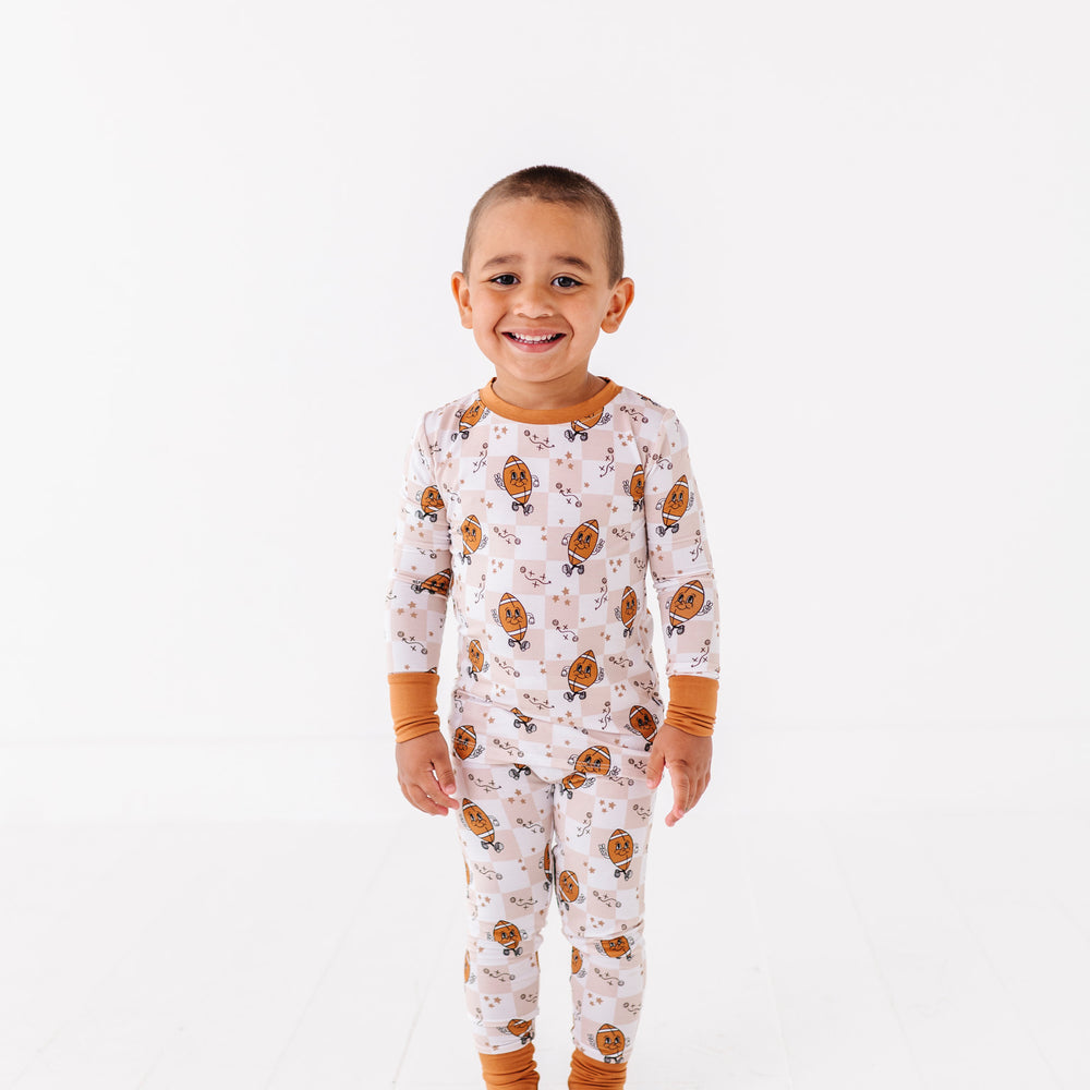 
                      
                        Pigskin Pals Kids Pajamas
                      
                    