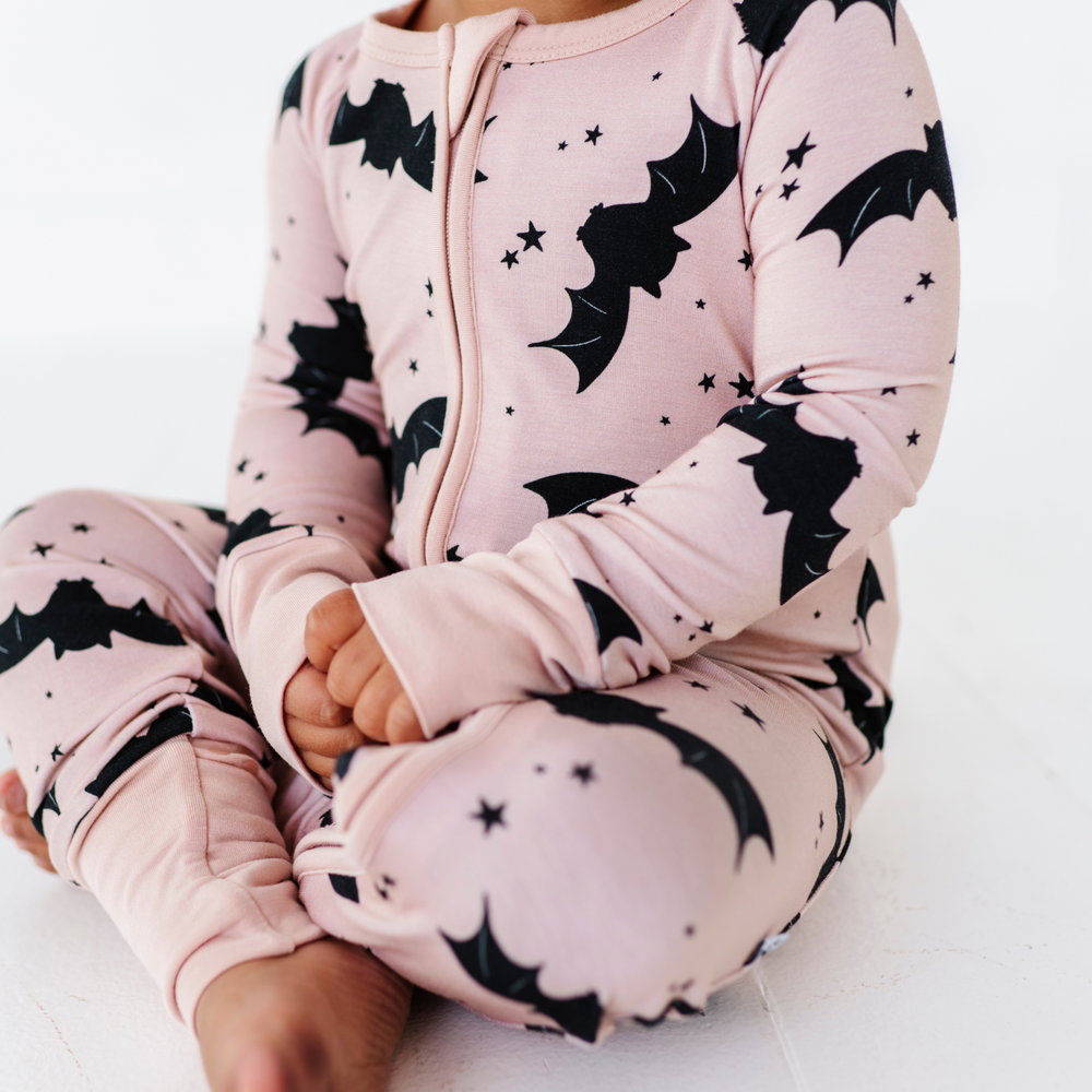 
                      
                        Baby in Halloween Bat Pajamas by Kiki and Lulu
                      
                    