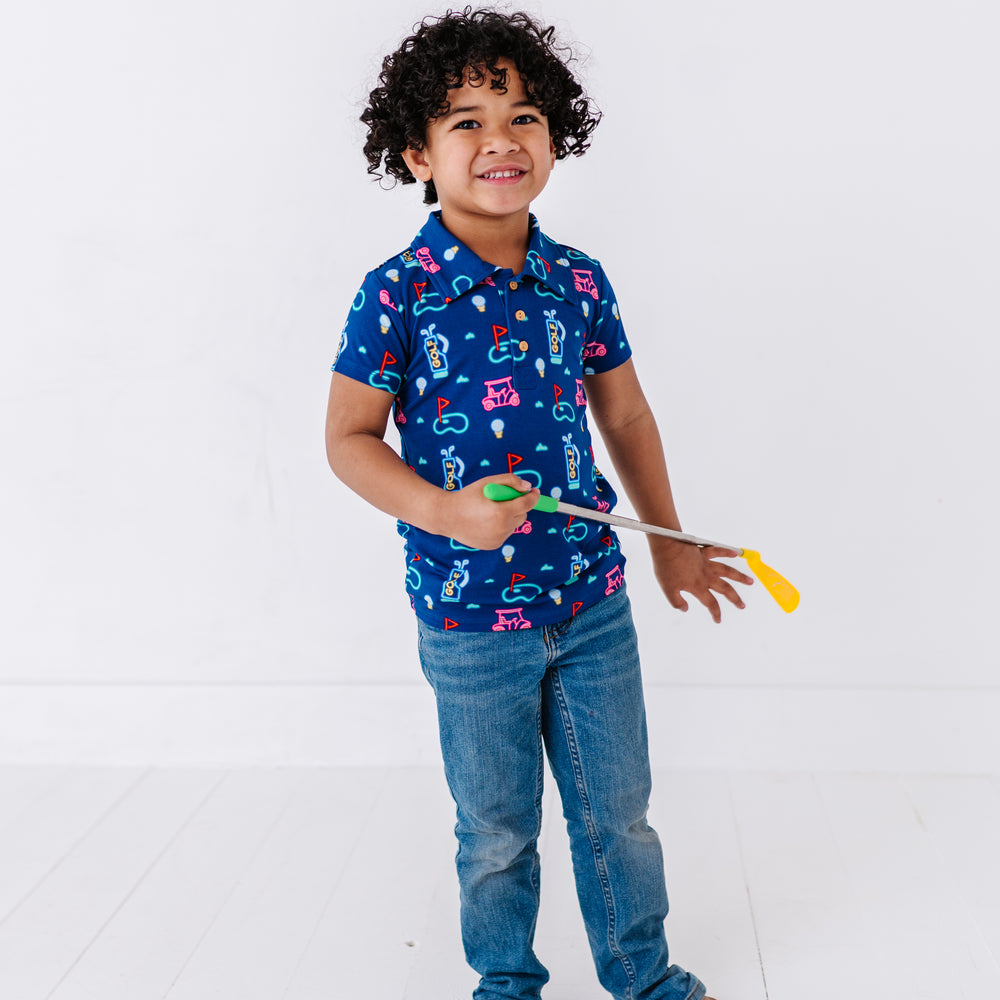 
                      
                        Boy Sporting Neon Golf Polo By Kiki and Lulu
                      
                    