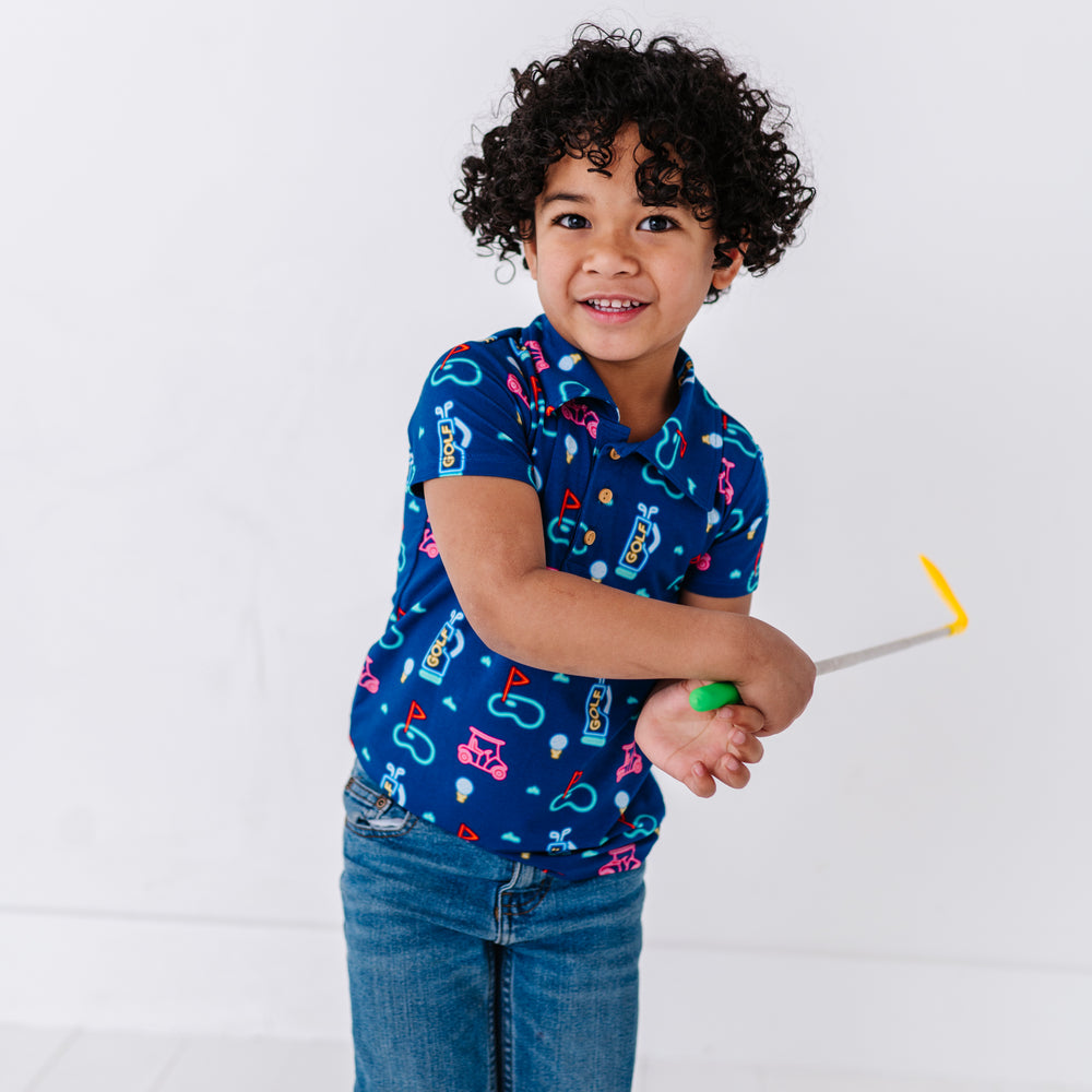 
                      
                        Boy In Neon Golf Polo By Kiki and Lulu
                      
                    