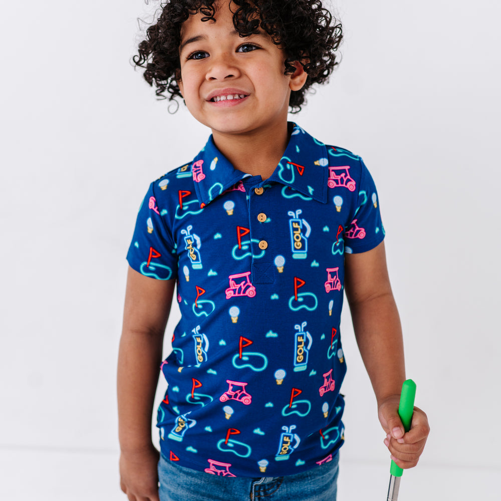 
                      
                        Boy Sporting Neon Golf Polo By Kiki and Lulu
                      
                    