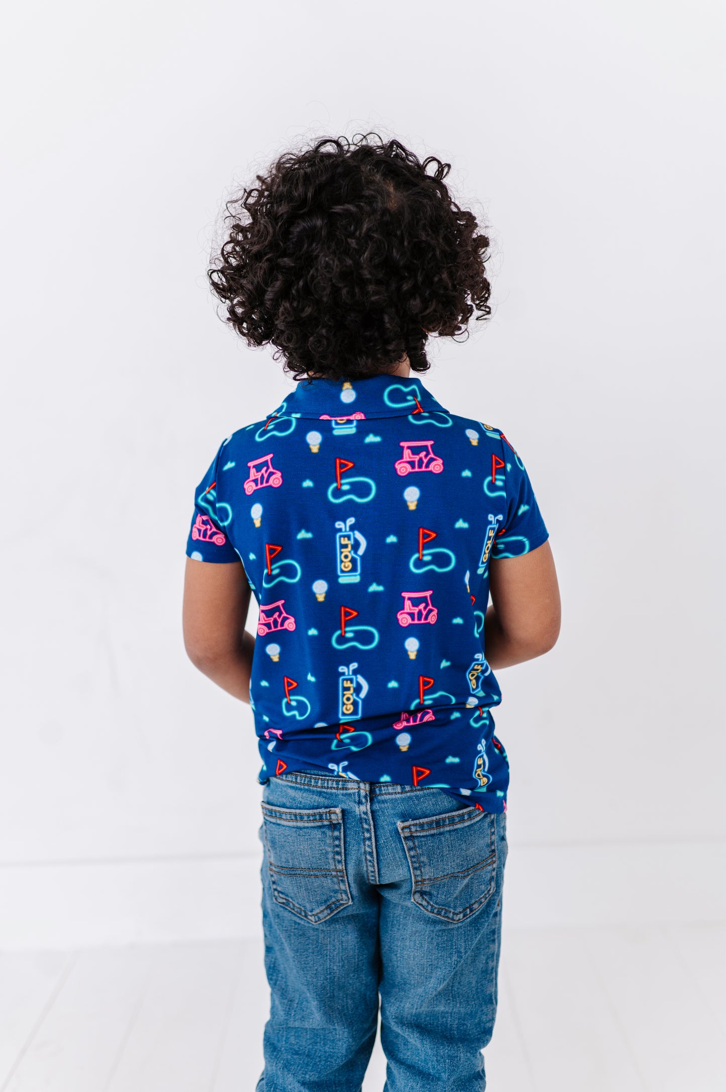 Boy Wearing Neon Golf Polo By Kiki and Lulu