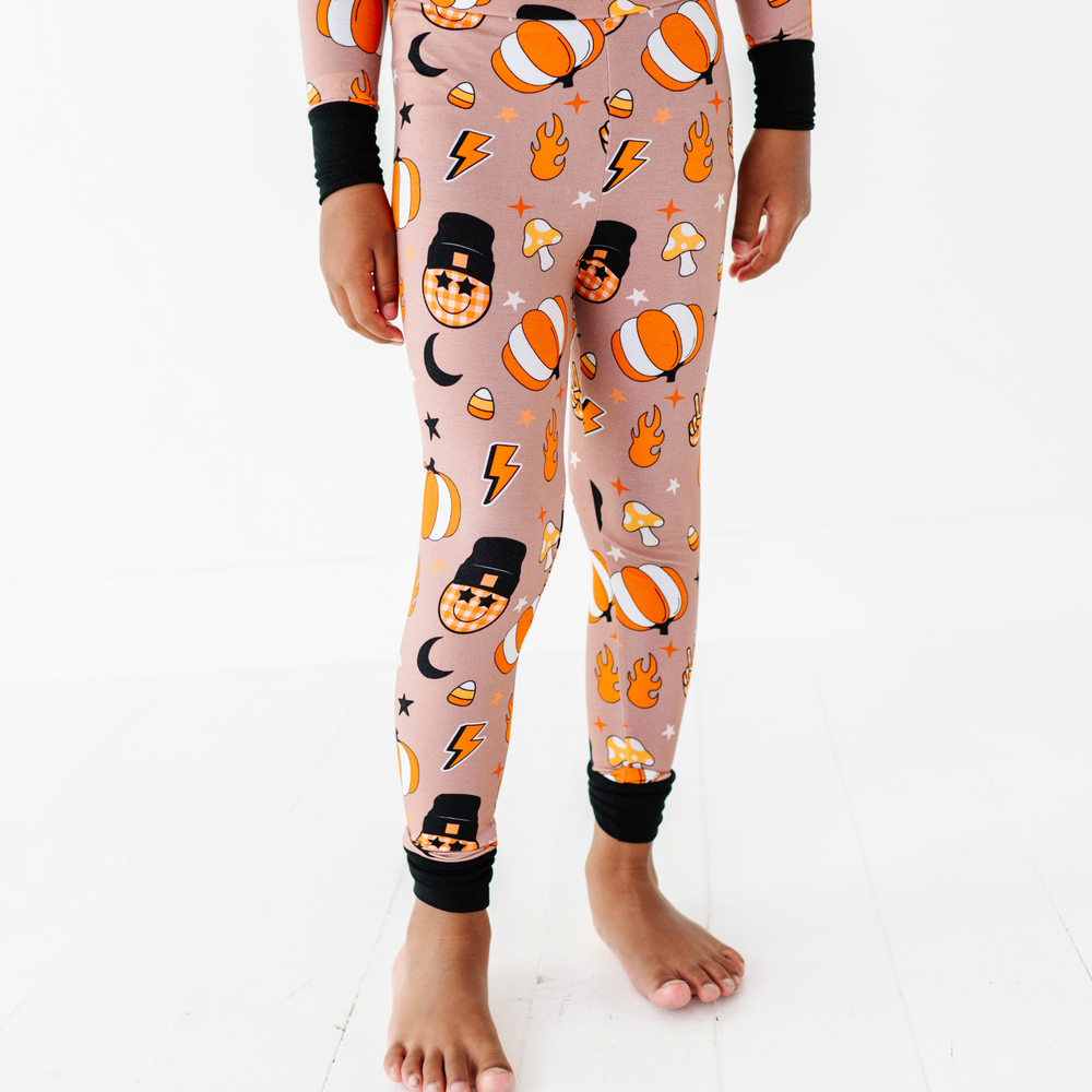 
                      
                        Boy wearing retro pumpkin pajamas by Kiki and Lulu
                      
                    