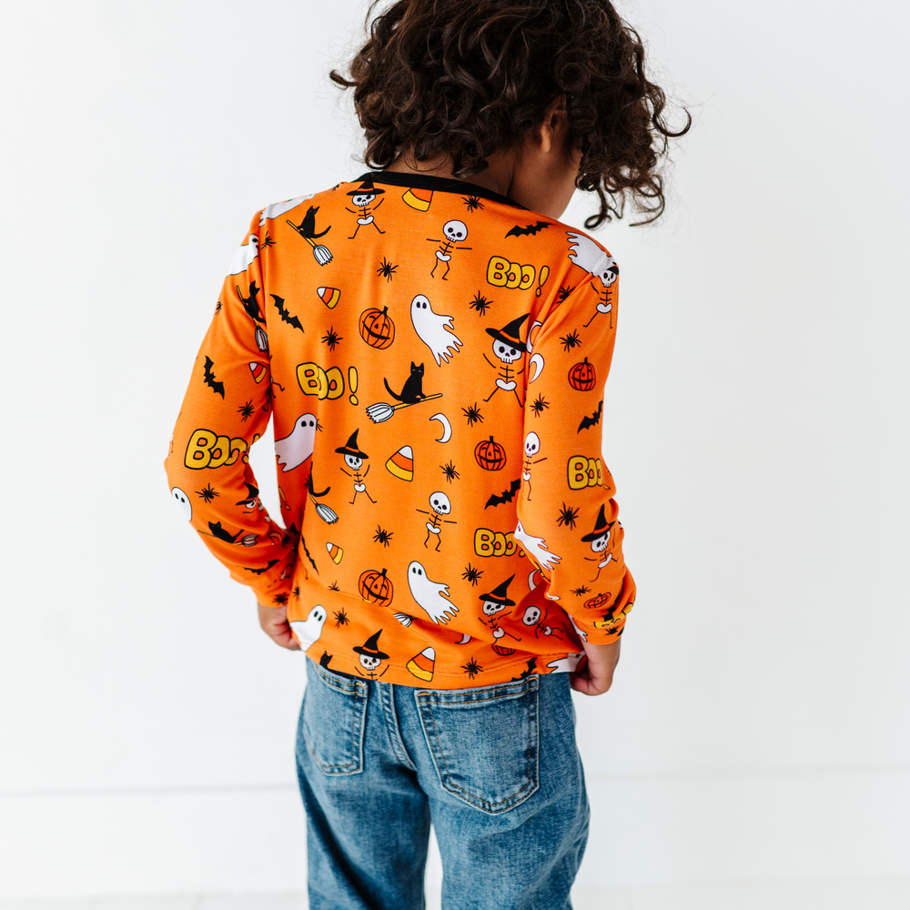 
                      
                         Boy wearing longsleeve Halloween shirt by Kiki and Lulu
                      
                    