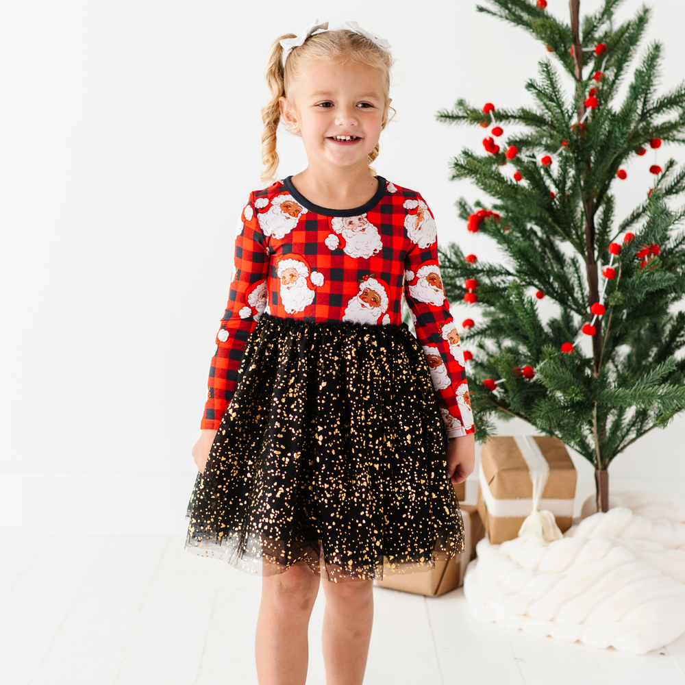 
                      
                        Girl in Santa Christmas dress with foil tulle by Kiki and Lulu
                      
                    