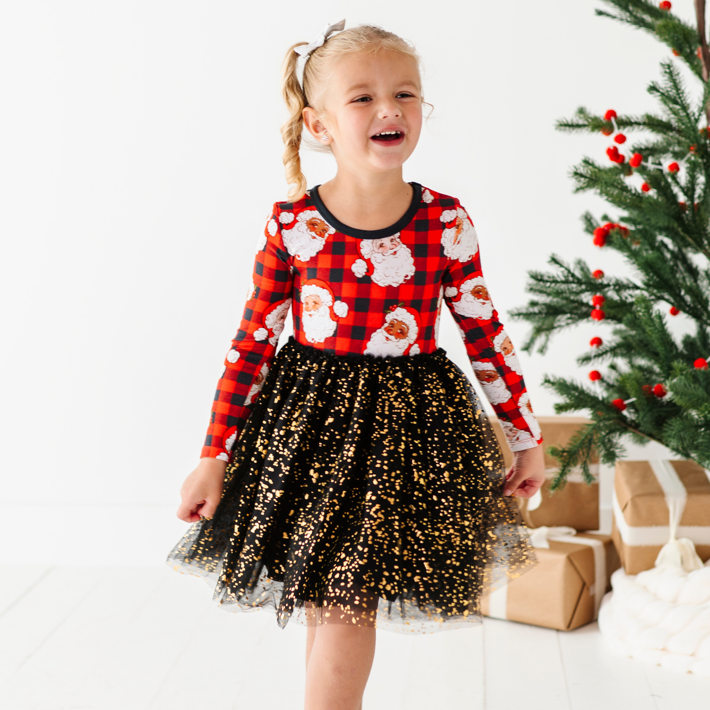 Girl in Santa Christmas dress with foil tulle by Kiki and Lulu