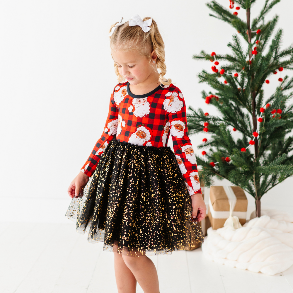 
                      
                        Girl in Santa Christmas dress with foil tulle by Kiki and Lulu
                      
                    