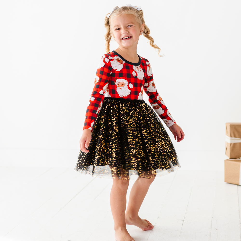 
                      
                        Girl in Santa Christmas dress with foil tulle by Kiki and Lulu
                      
                    