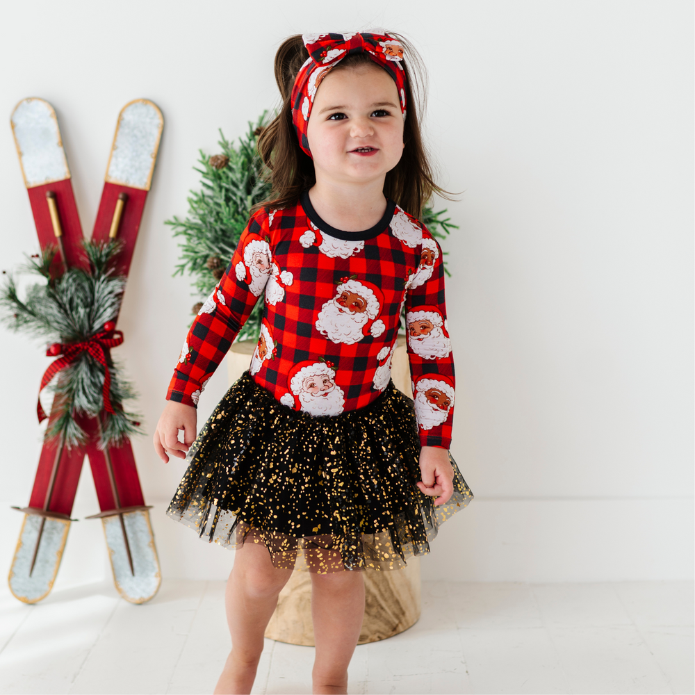 
                      
                        Girl in Christmas dress with tulle by Kiki and Lulu
                      
                    