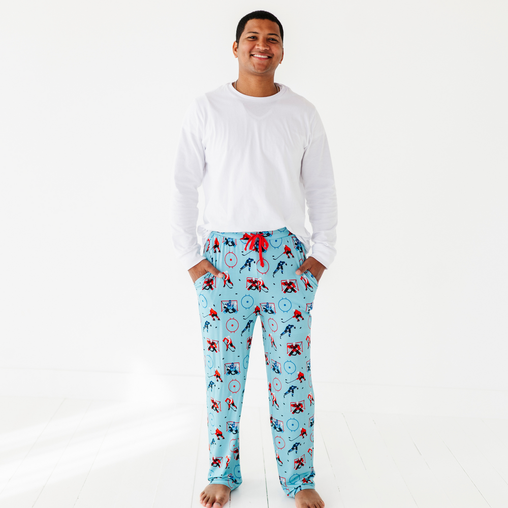 Man in hockey pajama pants