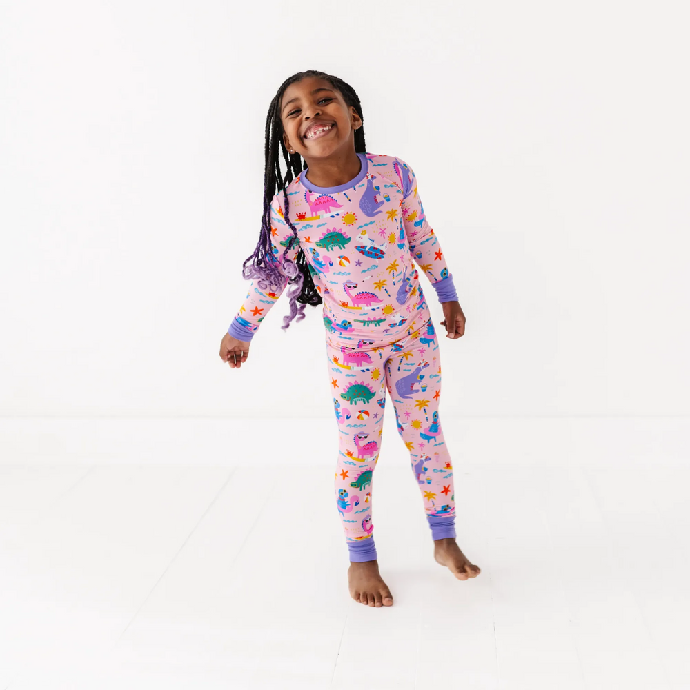 
                      
                        Pink dinosaur pajamas by Kiki and Lulu
                      
                    