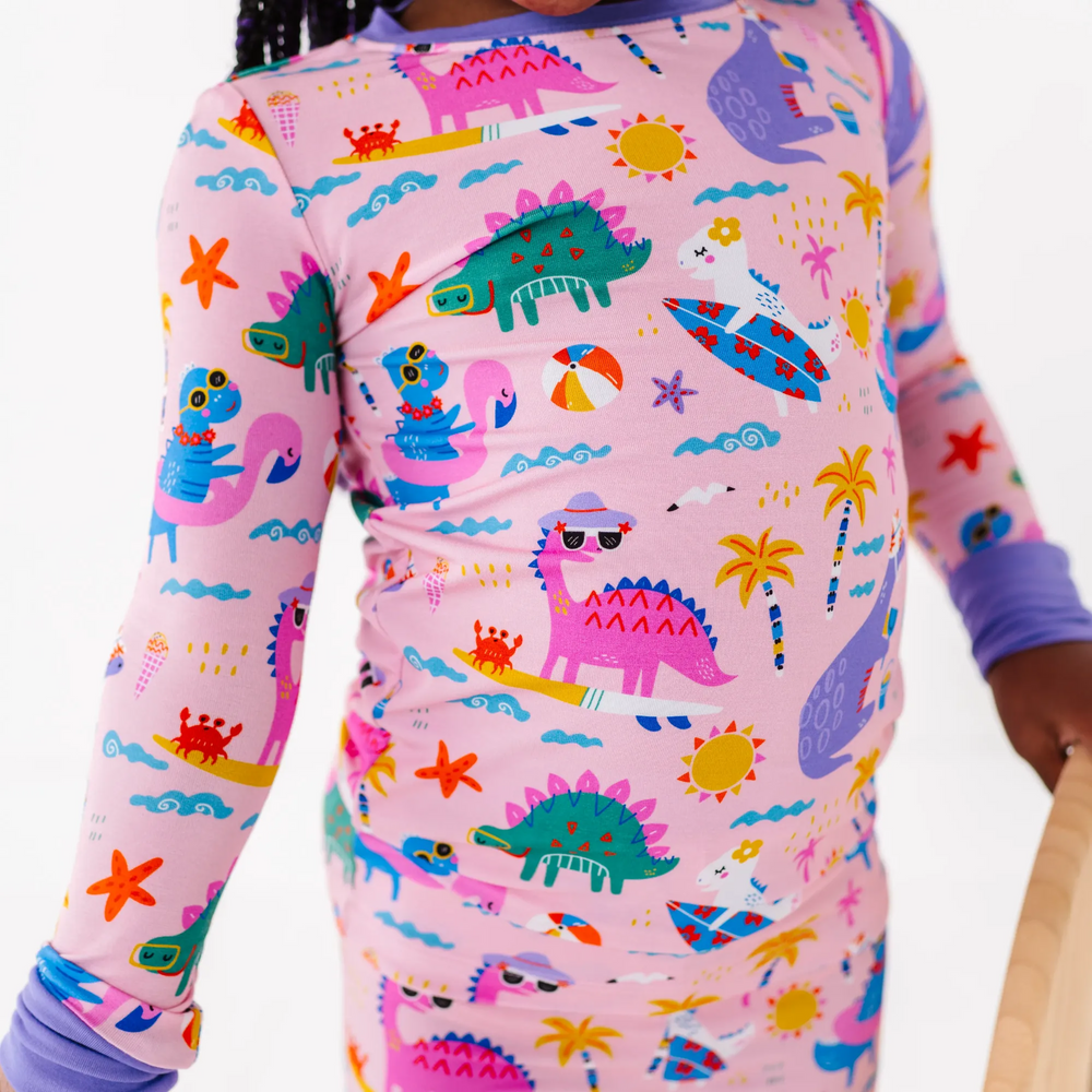 
                      
                        Pink dinosaur pajamas by Kiki and Lulu
                      
                    