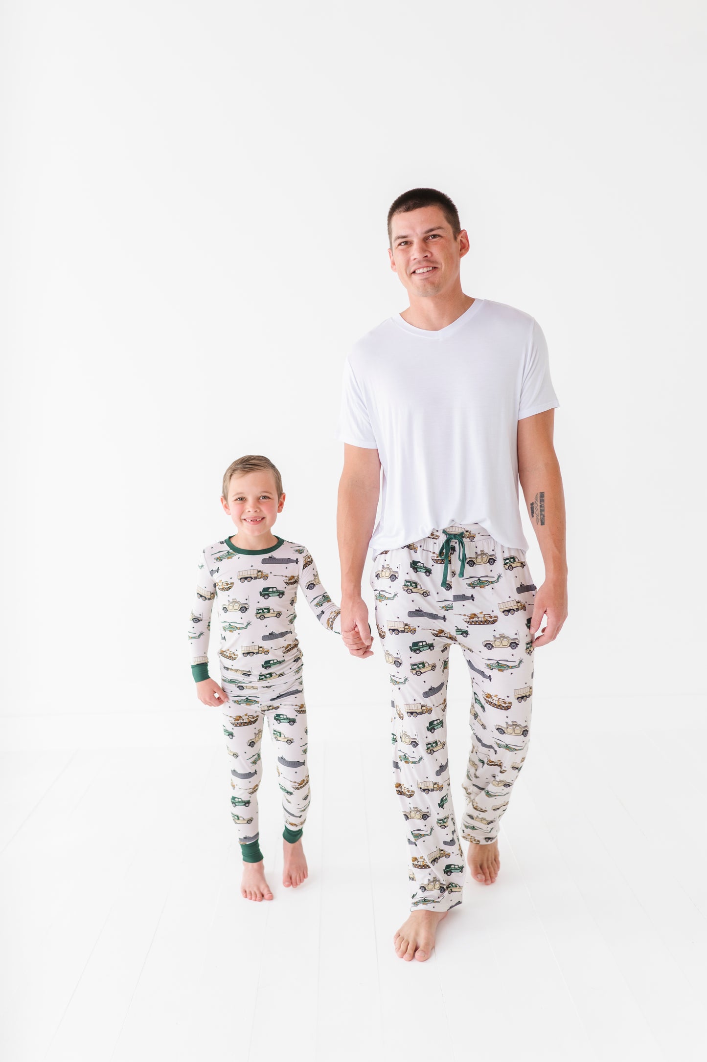 Father and son in matching military pajamas  by Kiki Lulu