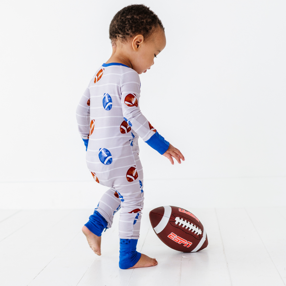 
                      
                        Boy in Football Convertible Footies by Kiki and Lulu
                      
                    