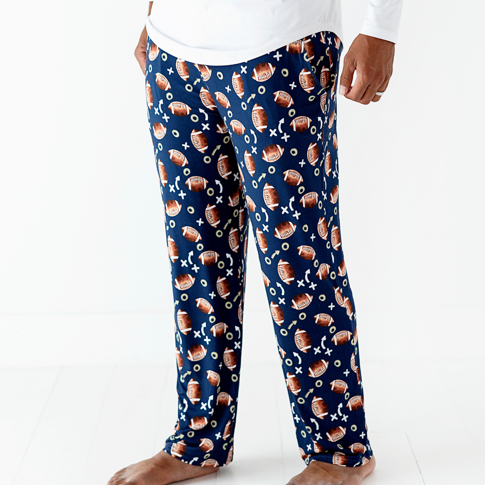 man in football lounge pants