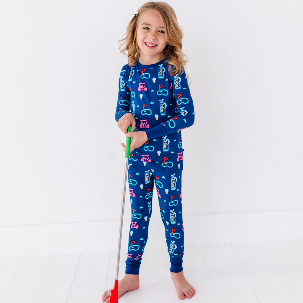 Girl in Neon Golf Pajamas
