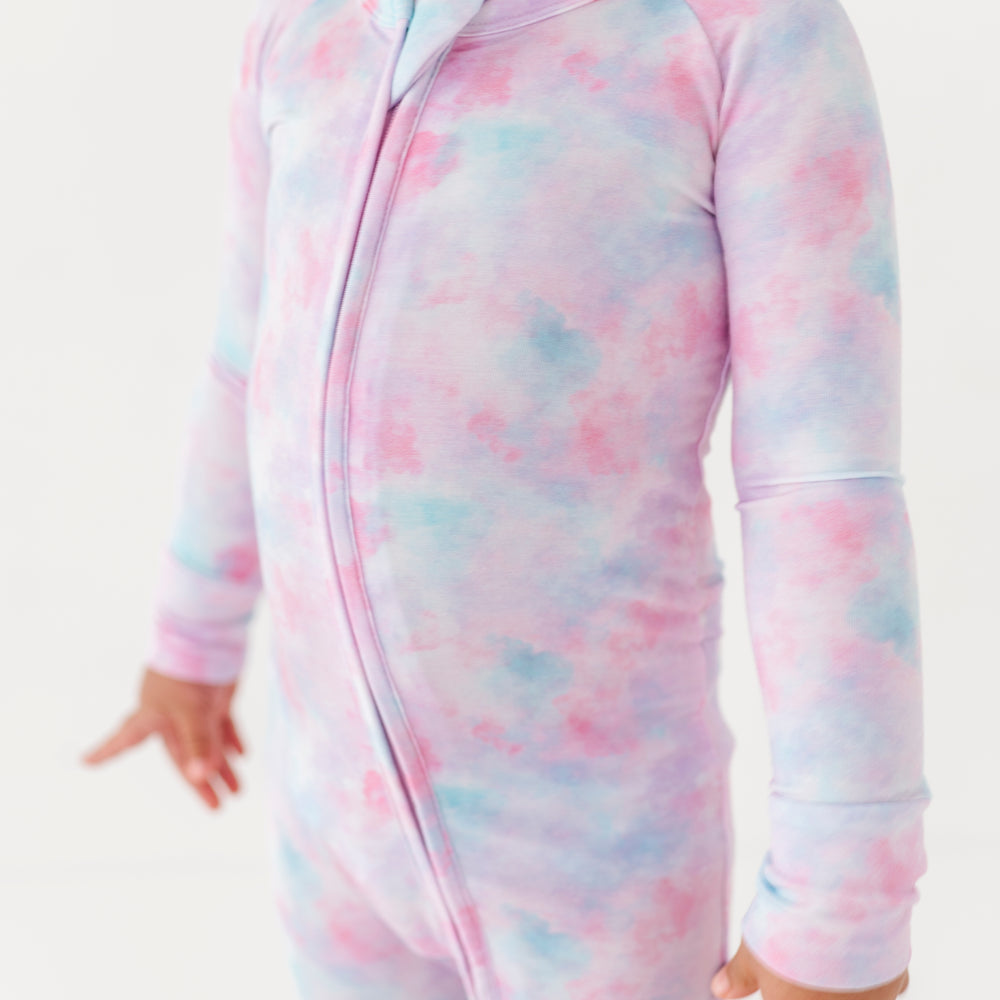 
                      
                        Girl in tie dye convertible footies by Kiki and Lulu
                      
                    