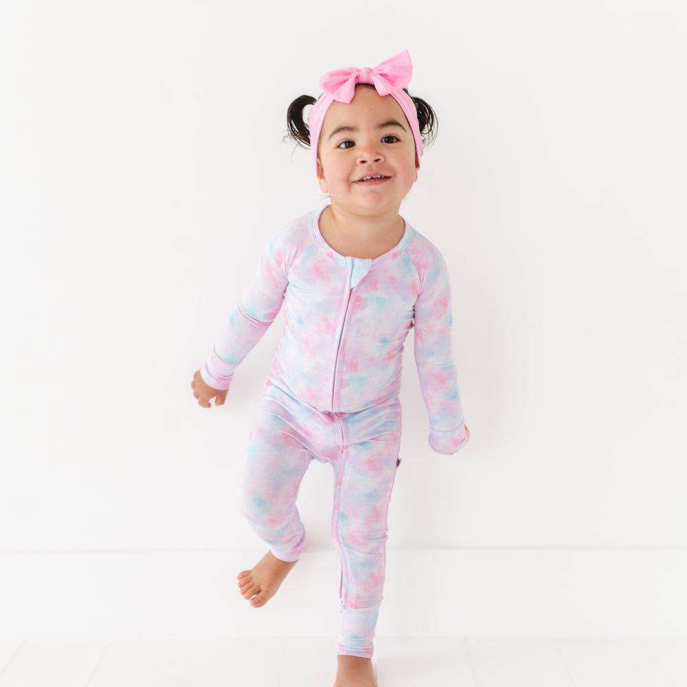 
                      
                        Girl in tie dye convertible footies by Kiki and Lulu
                      
                    