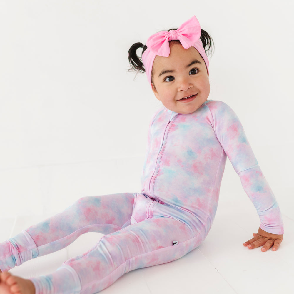 
                      
                        Girl in tie dye convertible footies by Kiki and Lulu
                      
                    