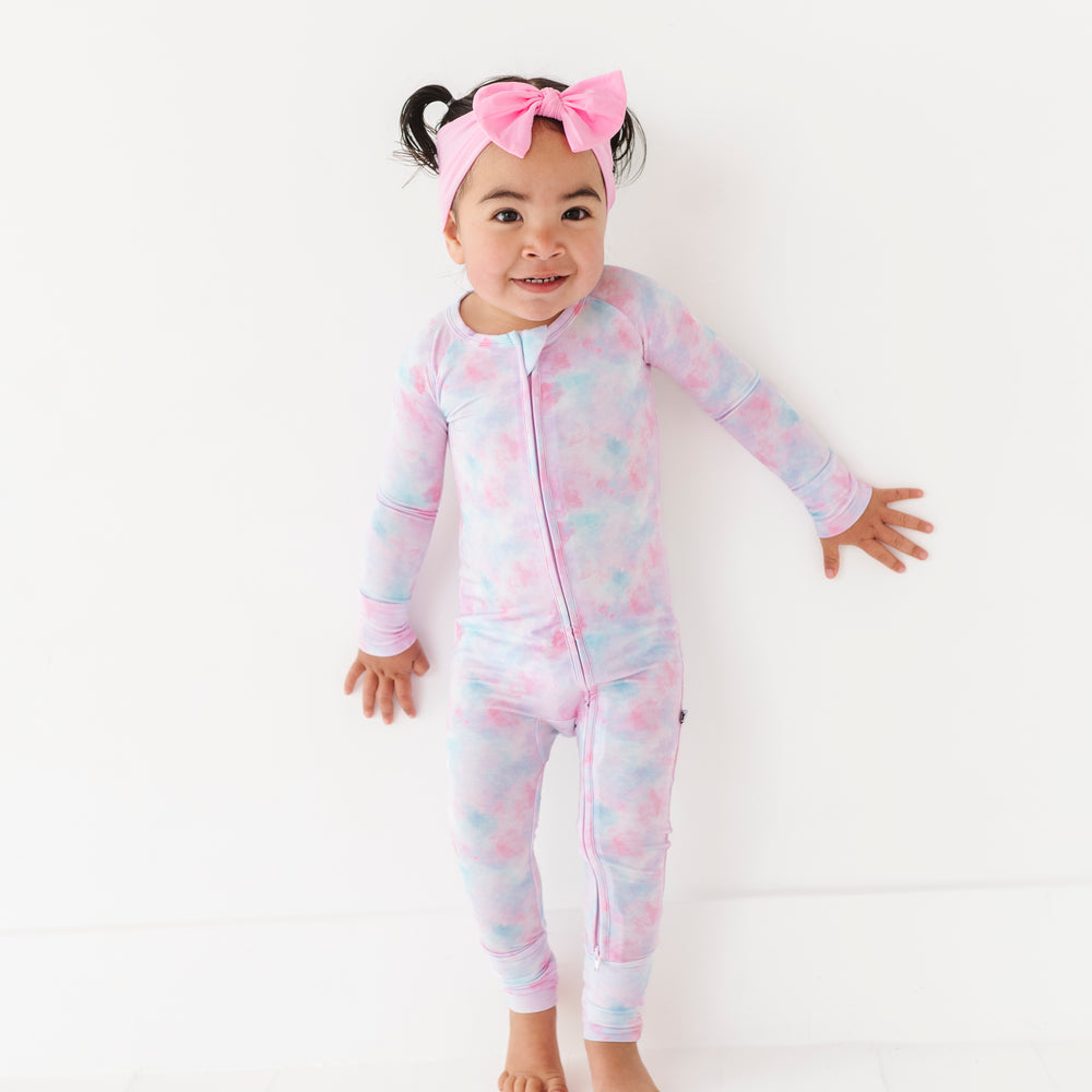 
                      
                        Girl in tie dye convertible footies by Kiki and Lulu
                      
                    