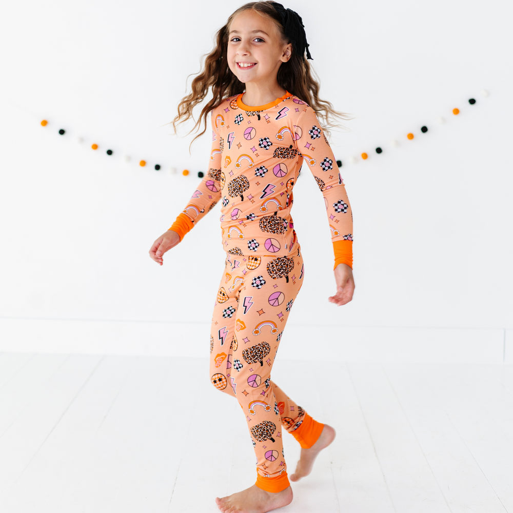 
                      
                        Girl in retro fall pajamas by Kiki and Lulu
                      
                    