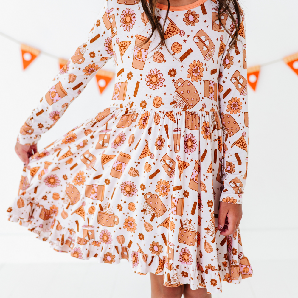 
                      
                        Girl in Pumpkin Spice Latte Dress by Kiki and Lulu
                      
                    