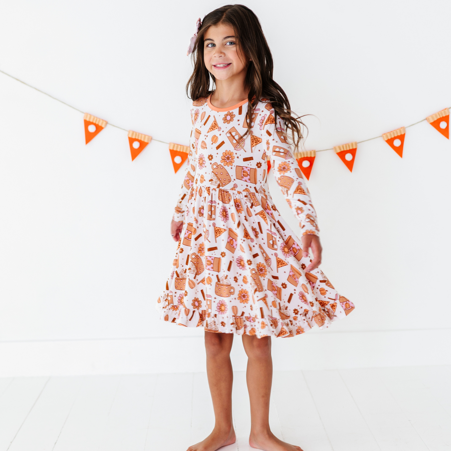 Girl in Pumpkin Spice Latte Dress by Kiki and Lulu