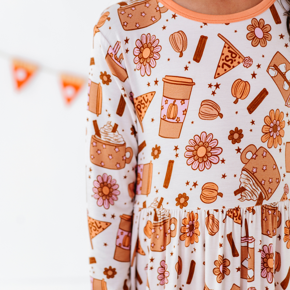 Girl in Pumpkin Spice Latte Dress by Kiki and Lulu