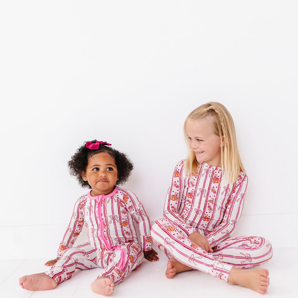 
                      
                        Girls in Matching Pumpkin Pajamas
                      
                    