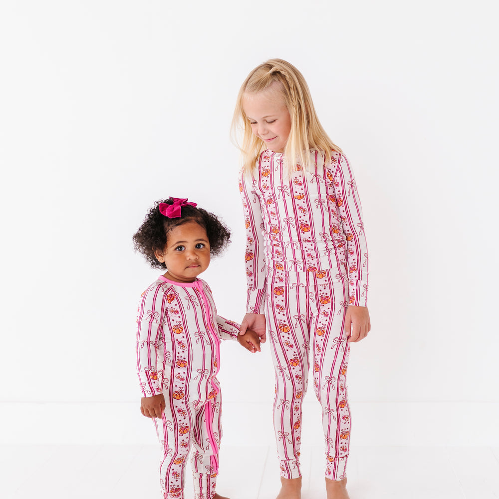 
                      
                        Girls in Matching Pumpkin Pajamas
                      
                    