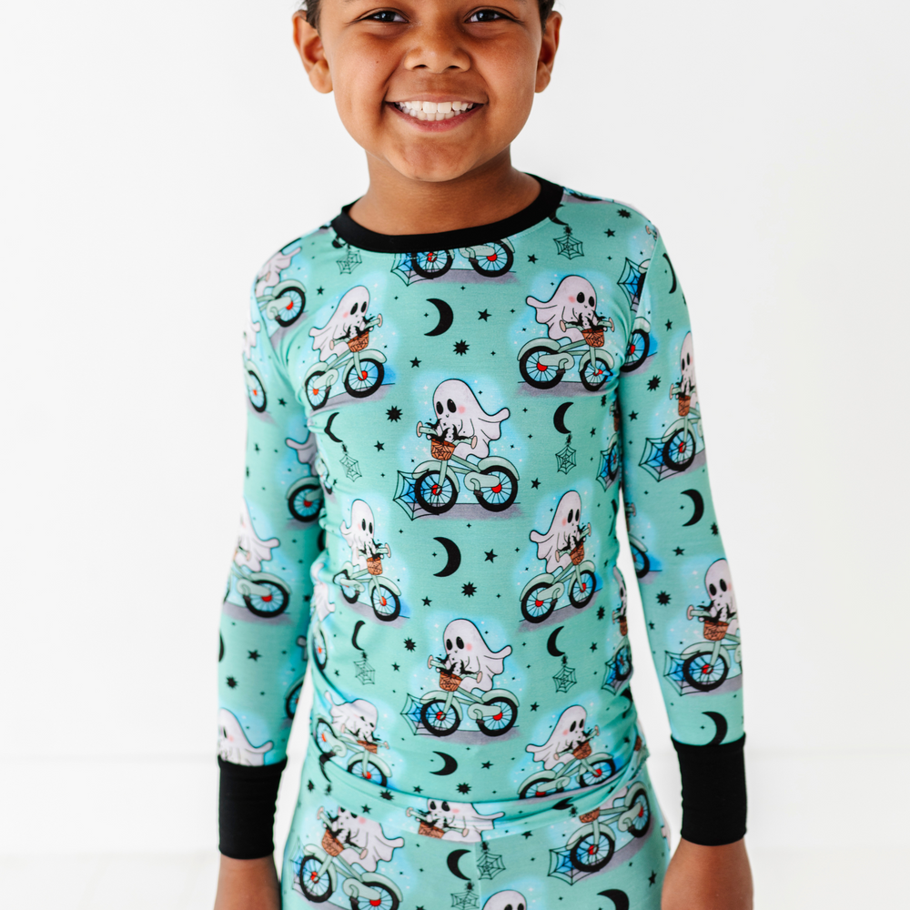 
                      
                        Boy wearing motorcycle ghost pajamas by Kiki and Lulu
                      
                    