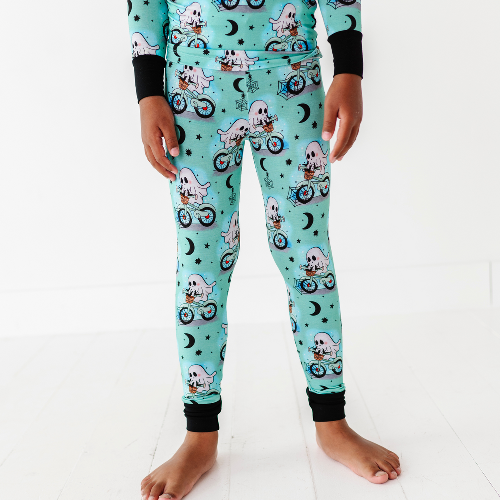 
                      
                        Boy wearing motorcycle ghost pajamas by Kiki and Lulu
                      
                    