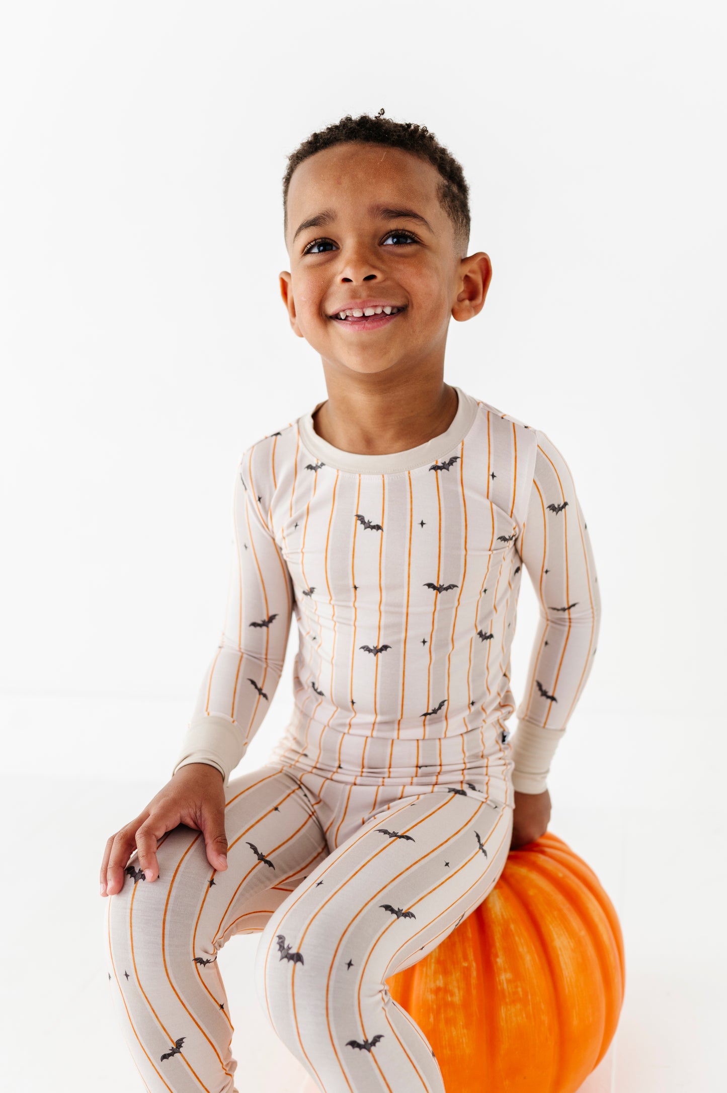 Kids Halloween PJs with bats for siblings in soft bamboo fabric