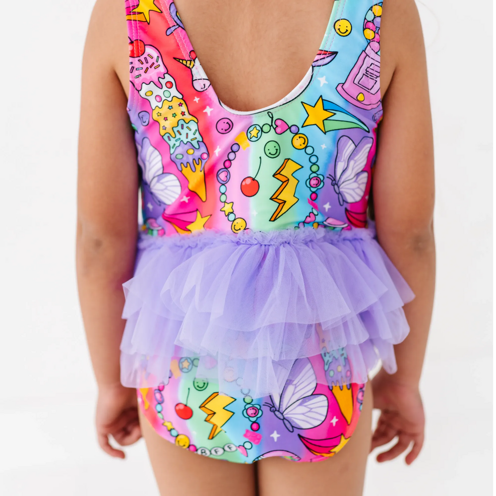 
                      
                        Cosmic Candyland Swimsuit With Tutu
                      
                    