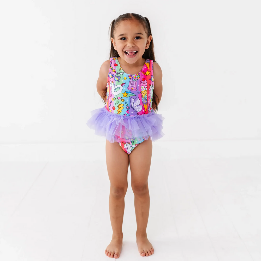 
                      
                        Cosmic Candyland Swimsuit With Tutu
                      
                    