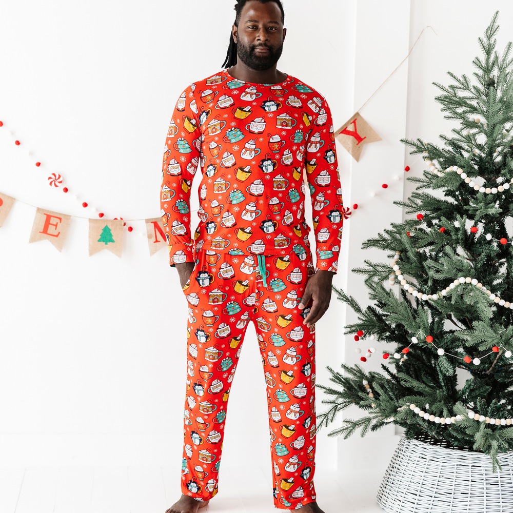 Man in family matching Christmas cocoa pajamasMan in family matching Christmas cocoa pajamas